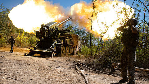 Ukrainian servicemen of the 44th artillery brigade fire a 2s22 Bohdana self-propelled howitzer towards Russian positions at the frontline in the Zaporizhzhia region, Ukraine, Wednesday, Aug. 20, 2025.