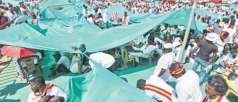 Others spread floor mats and converted them into makeshift tents to shield themselves from the blazing sun.