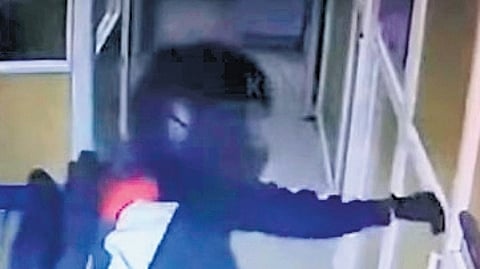 CCTV footage of the man leaving the bank after the robbery