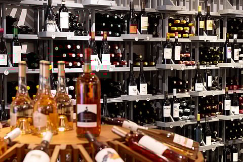 Bottles of wine, many of which are affected by tariffs on imports, are seen for sale at DCanter, a boutique wine store, in Washington, DC, August 19, 2025.