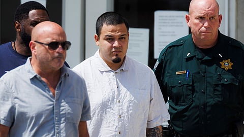 Kilmar Abrego Garcia, center, leaves the Putnam County Jail, Friday, Aug. 22, 2025, in Cookeville, Tenn.