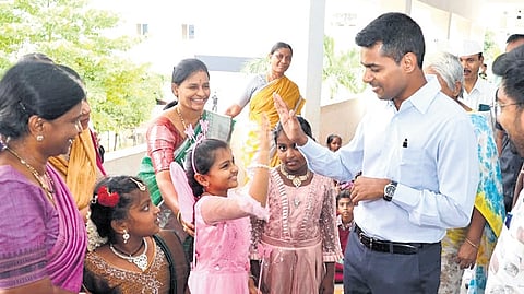 As part of the inaugural ‘Bagless Saturday’, District Collector Anudeep Durishetty interacts with students at the collectorate in Khammam on Saturday