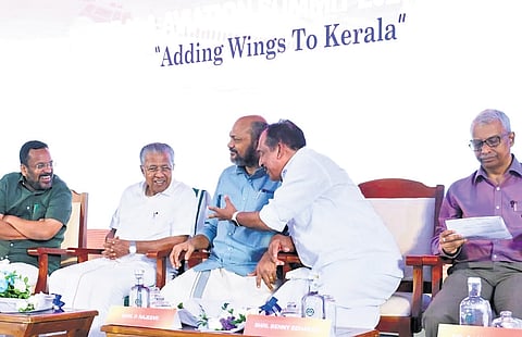 Chief Minister Pinarayi Vijayan, ministers K Rajan and P Rajeeve interacting with Chalakkudy MP Benny Behanan during the inaugural ceremony of Kerala Aviation Summit on Saturday. Kerala Chief Secretary A Jayathilak is also seen
