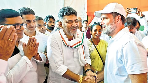 Karnataka Deputy CM D K Shivakumar greets LoP in Lok Sabha Rahul Gandhi during the ‘Voter Adhikar Yatra’ in Katihar, Bihar, on Saturday