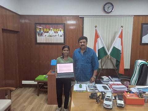 Keerthana Sara Kiran introduces the website named 'Yaathraakoottu' to Transport Minister KB Ganesh Kumar.