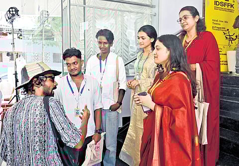 A director engaging with the audience after a film screening at the IDSFFK in Thiruvananthapuram on Saturday