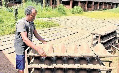 Clay tiles are being sun-dried as part of the production process