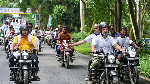 Leader of Opposition in the Lok Sabha Rahul Gandhi and RJD leader Tejashwi Yadav ride motorcycles with others during the 'Voter Adhikar Yatra', in Bihar.
