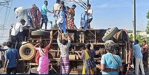Local people removing injured students from the school van which overturned at the Madurai–Dhanushkodi National Highway on Tuesday, February 24, 2026