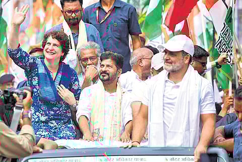 Chief Minister A Revanth Reddy with Rahul Gandhi and Priyanka Gandhi at Voter Adhikar Yatra in Supaul on Tuesday.