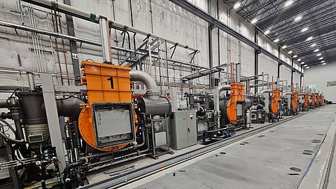 A row of specialized furnaces that are used to produce rare earth magnets sits inside the Noveon Magnetics plant in San Marcos, Texas.