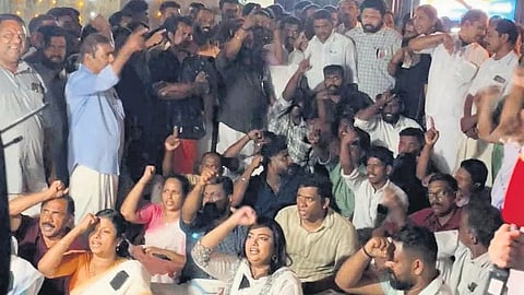 Congress workers protesting in front of Aryanad police station on Tuesday night demanding a copy of the FIR in the Sreeja suicide case