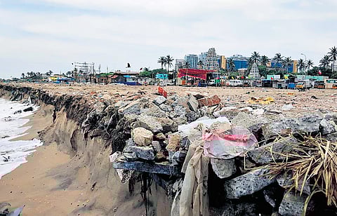 Foreshore Estate beach covered with construction debris on Thursday morning