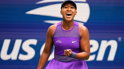 Naomi Osaka, of Japan, reacts after scoring a point against Hailey Baptiste, of the United States, during the second round of the U.S. Open tennis championships, Thursday, Aug. 28, 2025, in New York.