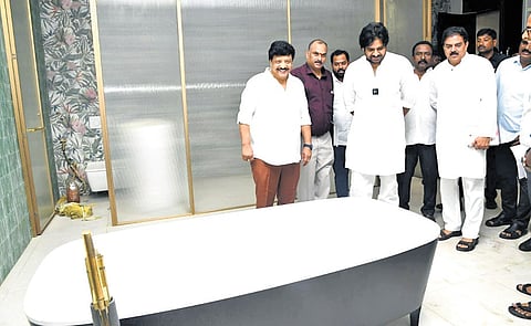 Deputy Chief Minister Pawan Kalyan, Ministers K Durgesh and Nadendla Manohar inspect Rushikonda buildings in Visakhapatnam on Friday.