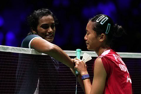 PV Sindhu (L) and Putri Kusuma Wardani after their quarterfinal clash in Paris on Friday