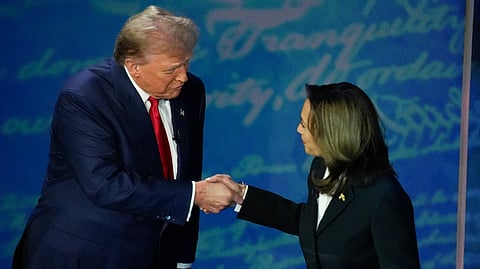 Donald Trump and Kamala Harris shake hands before the start of an ABC News presidential debate at the National Constitution Center, Tuesday, Sept. 10, 2024.