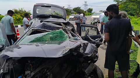 In an accident occured at K Bandarapalli, on the Chennai–Bengaluru carriageway, J Devaraj (65) died after the car driven by his son, D Narasimhaprasad, rammed a container lorry moving ahead of them.