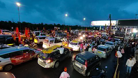 Supporters of activist Manoj Jarange Patil on their way to Mumbai's Azad Maidan to participate in his Maratha reservation protest, at Vashi Toll Plaza, in Navi Mumbai, Friday, Aug. 29, 2025