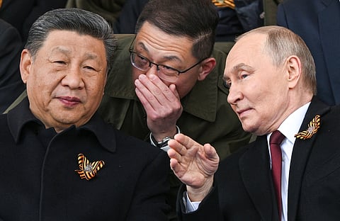 Russian President Vladimir Putin, right, and Chinese President Xi Jinping.