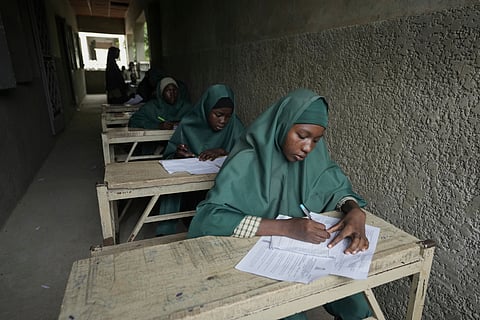 Students of the Future Prowess Islamic Foundation School take a terminal exam, in Maiduguri, Nigeria, Thursday, July 24, 2025.