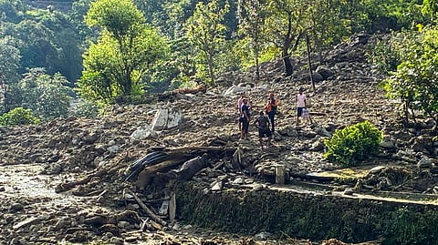 SDRF personnel conduct a search and rescue operation at a cloudburst-hit village, in Rudraprayag district, Uttarakhand, Friday, Aug. 29, 2025.