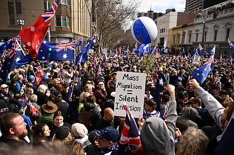 Protestors gather during the March for Australia anti-immigration rally in Melbourne, Sunday, Aug. 31.