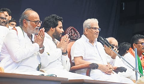 Dharmadhikari Veerendra Heggade addresses a gathering in Belthangady on Sunday. JDS youth wing president Nikhil Kumaraswamy is also seen