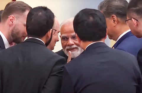 In this screengrab from a video released on Sep 01, 2025, Prime Minister Narendra Modi shares a moment of interaction with Russian President Vladimir Putin, Chinese President Xi Jinping and other world leaders at the 25th SCO Heads of State Council Summit, in Tianjin, China.