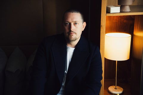 This photo provided by Hallwood shows British AI music creator Oliver McCann