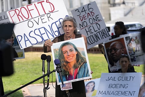 Nadia Milleron, parent of Samya Rose Stumo, one of the victims of the Boeing 737 Max crash in Ethiopia, holds her photograph as she speaks at a news conference on Capitol Hill, June 18, 2024, in Washington.