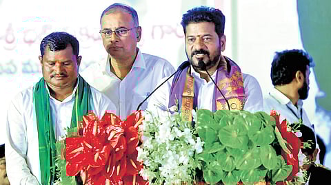 Chief Minister A Revanth Reddy addresses a public meeting at Dameracherla village in Chandrugonda mandal in Bhadradri Kothagudem district on Wednesday.
