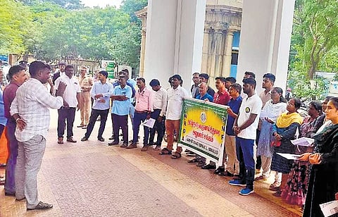 Employees of the revenue department, including record clerks, revenue inspectors and tahsildars, holding a protest in Chennai on Wednesday