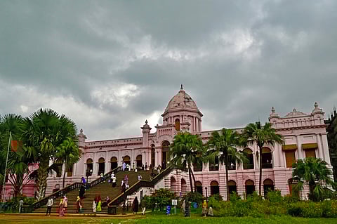 In this photograph taken on August 20, 2025, people visit the riverside pink palace Ahsan Manzil, a government museum and the former residence of Sir Salimullah Bahadur - the last prince or Nawab of Dhaka, in Dhaka.