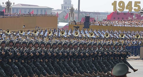 Military personnel take part in a military parade to commemorate the 80th anniversary of Japan's World War II surrender held in front of Tiananmen Gate in Beijing, Wednesday, Sept. 3, 2025.