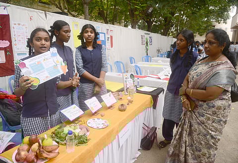 Students exhibiting their works