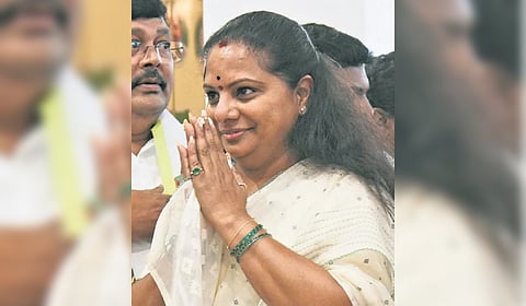 Telangana Jagruthi chief K Kavitha greets reporters at a press conference in Hyderabad on Wednesday.