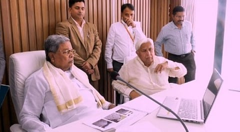 CM Siddaramaiah and Tourism Minister H K Patil and others during a meeting in Bengaluru on Wednesday.
