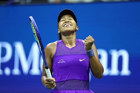 Japan's Naomi Osaka celebrates defeating Czech Republic's Karolina Muchova in their women's singles quarterfinal tennis match at the US Open on September 3, 2025.