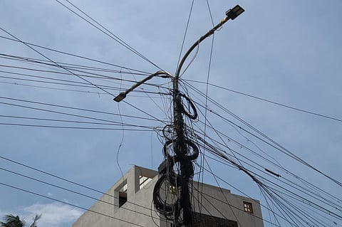 Residents say that connection providers often leave old wires hanging when they fix new ones, which increases the number of wires.