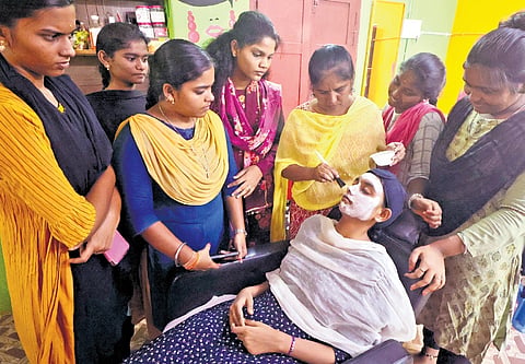 Women learning beautician skills as part of the Yellow Bag Foundation’s training programme in Madurai