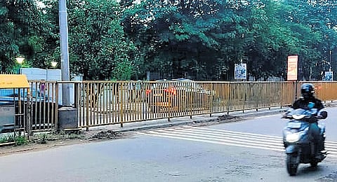 The 4-km barricade on Whitefield Main Road has left pedestrians with no option but to take a long detour just to go to the other side.