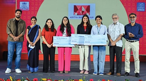 The New Indian Express editorial director Prabhu Chawla and resident editor, Odisha, Siba Mohanty presenting cash prizes to the winners Adyasha Mishra, Anwesha Rath and Prabalini Mishra.