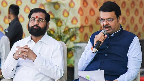 Maharashtra Deputy CM Eknath Shinde (L) with CM Devendra Fadnavis.