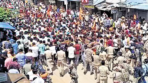 Police lathicharge protesting activists in Maddur on Monday.
