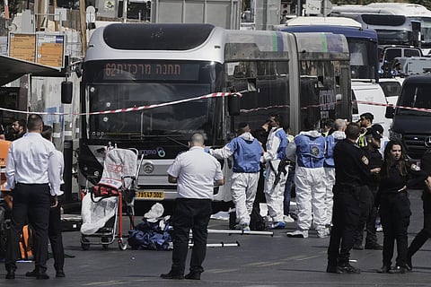 Israeli police and rescue teams respond at the scene of a shooting attack where several people killed and injured in Jerusalem, Monday, Sept 8, 2025.