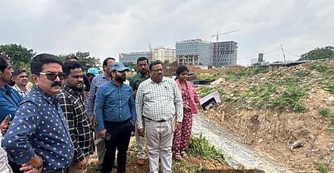 Bengaluru North City Corporation Commissioner Pommala Sunil Kumar is conducting an inspection.