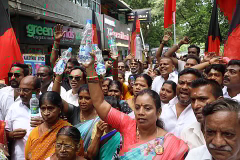 Puducherrys DMK cadres and Residents of Orleanpet constituency and Nellithope constituency led by Opposition leader R. Siva staged a protest infront of PWD Head office on Tuesday condemning the supply of contaminated drinking water that allegedly caused three deaths.