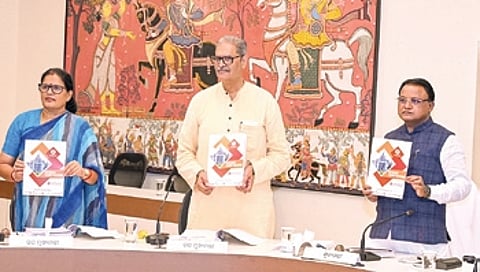 CM Mohan Charan Majhi releasing a compilation of key decisions taken in last 25 cabinet meetings, on Wednesday