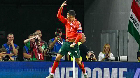 Portugal's Cristiano Ronaldo celebrates scoring a penalty goal during the 2026 World Cup qualifiers Europe zone group F football match between Hungary and Portugal on September 9, 2025 in Budapest, Hungary.